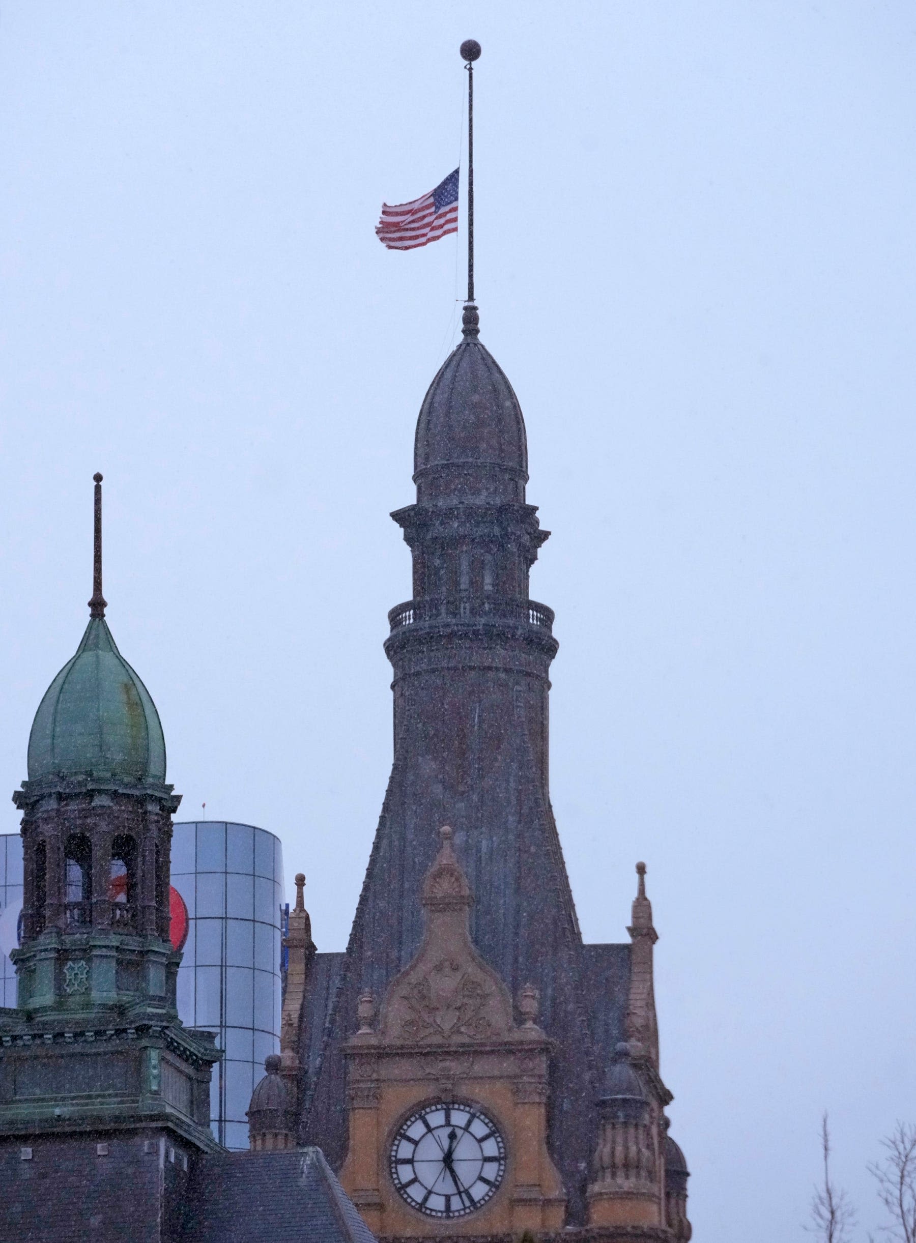 Why are the flags flying at half-staff in Wisconsin on Sunday?