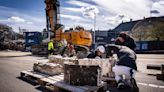 Traffic resumes near Copenhagen’s Old Stock Exchange after a fire ruined the 400-year-old landmark