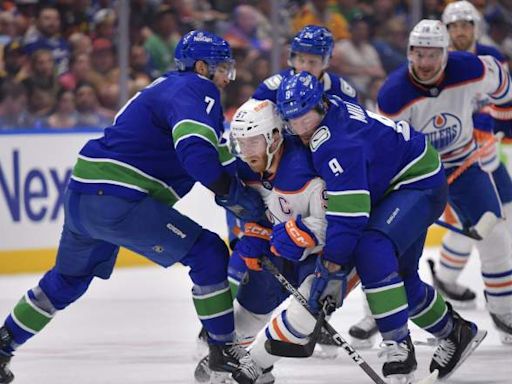 Canucks Team-Up, Brutally Cross-Check Connor McDavid’s Throat