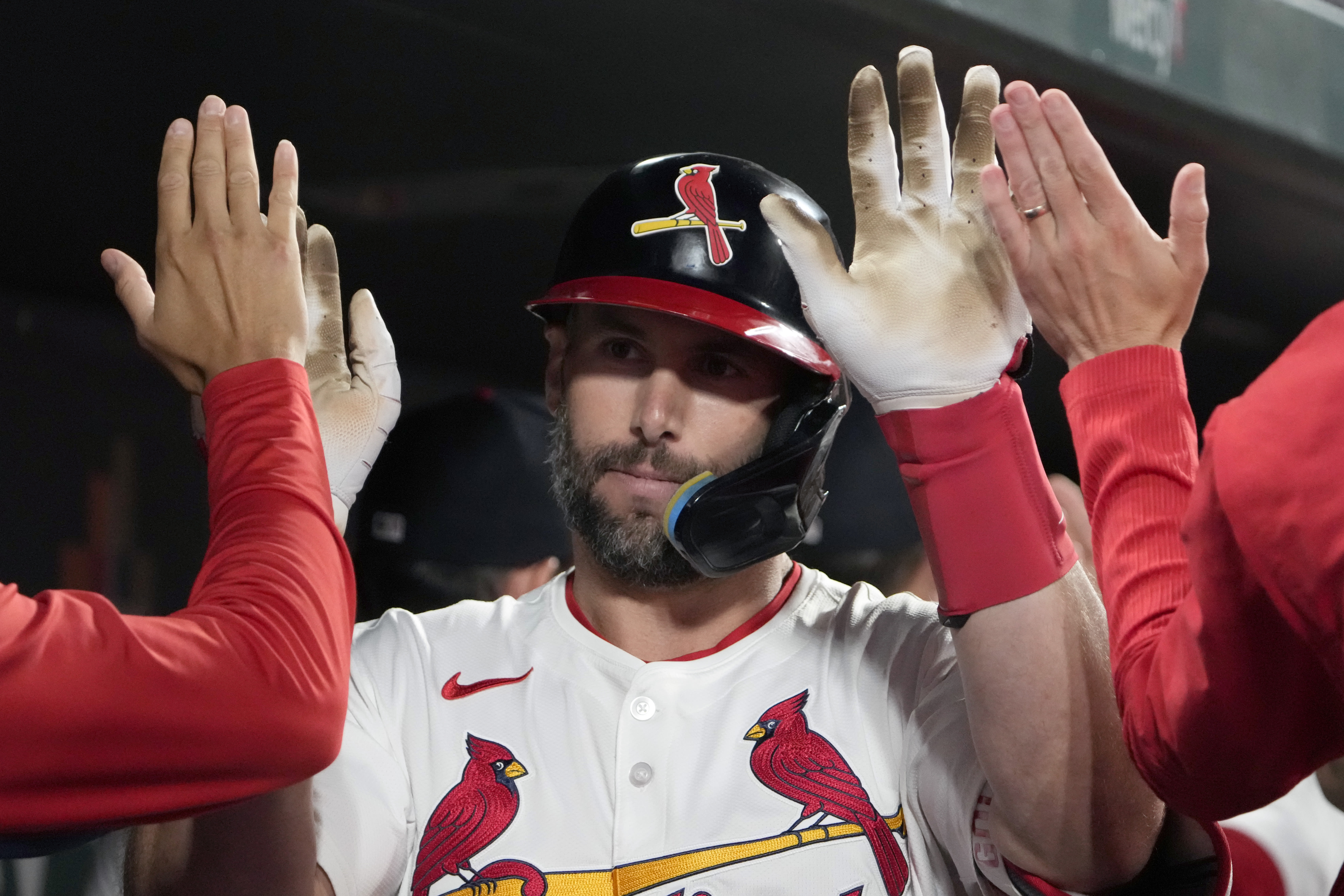 Goldschmidt homers twice to help Cardinals beat Cubs 4-3 after lengthy rain delay