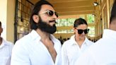 Mom-to-be Deepika Padukone holds Ranveer Singh's hand as they arrive at polling booth to cast votes. Watch