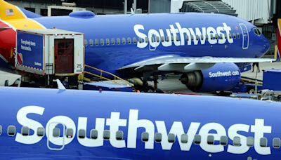 Southwest Airlines blames the boiling summer heat for exploding soda cans that have injured 20 flight attendants