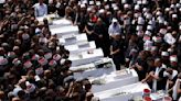 Mourners gather for funerals of children killed by Hezbollah attack