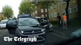 Watch: Two men threaten to put Jewish man in car boot