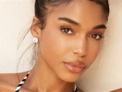 Lori Harvey In Skimpy Bikini Enjoys Rainfall Shower