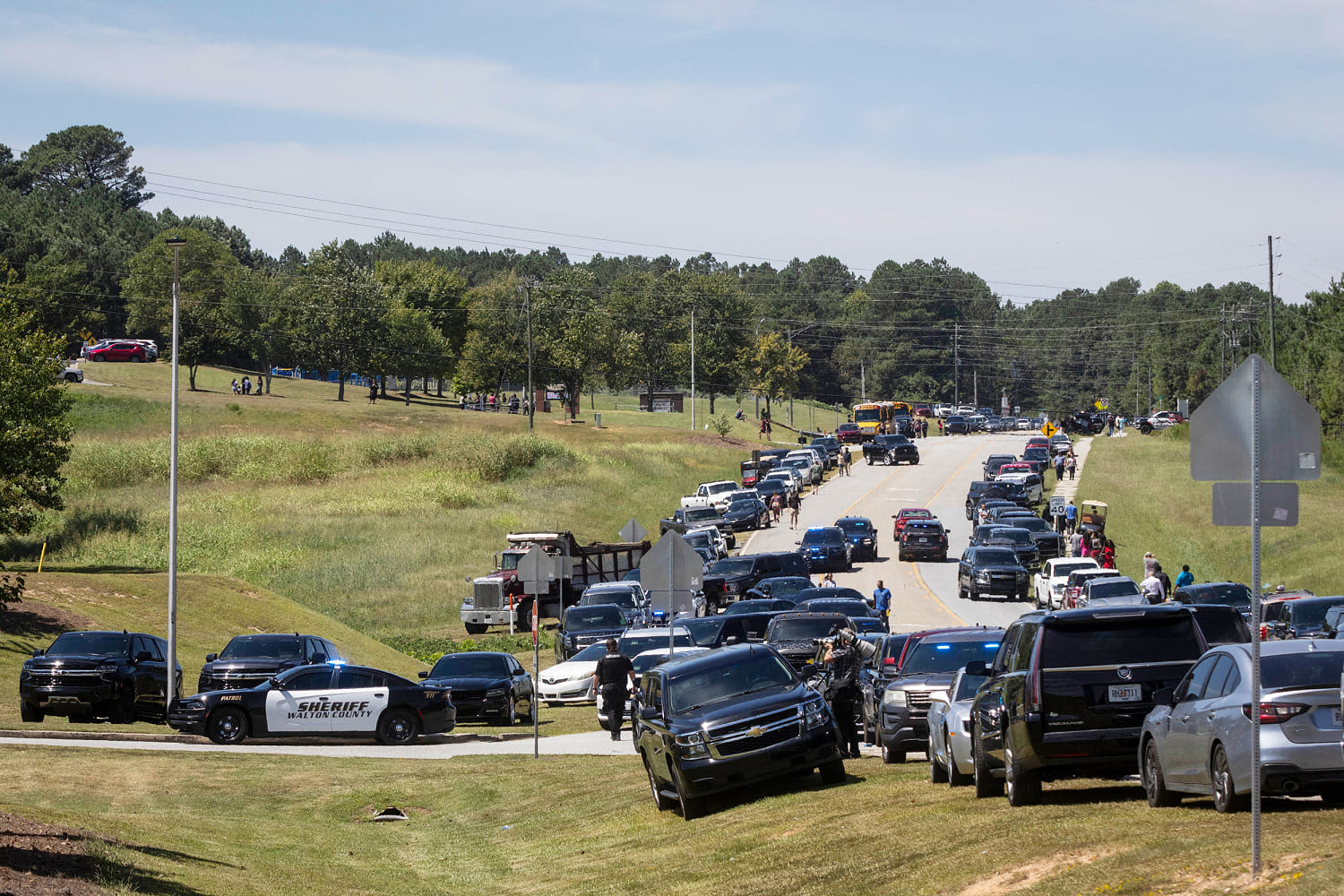 Two students, two teachers killed in Georgia high school shooting; 14-year-old suspect is in custody