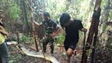 Mother killed and half swallowed by 30ft python