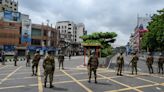 Bangladesh army out in force as police fire on protesters