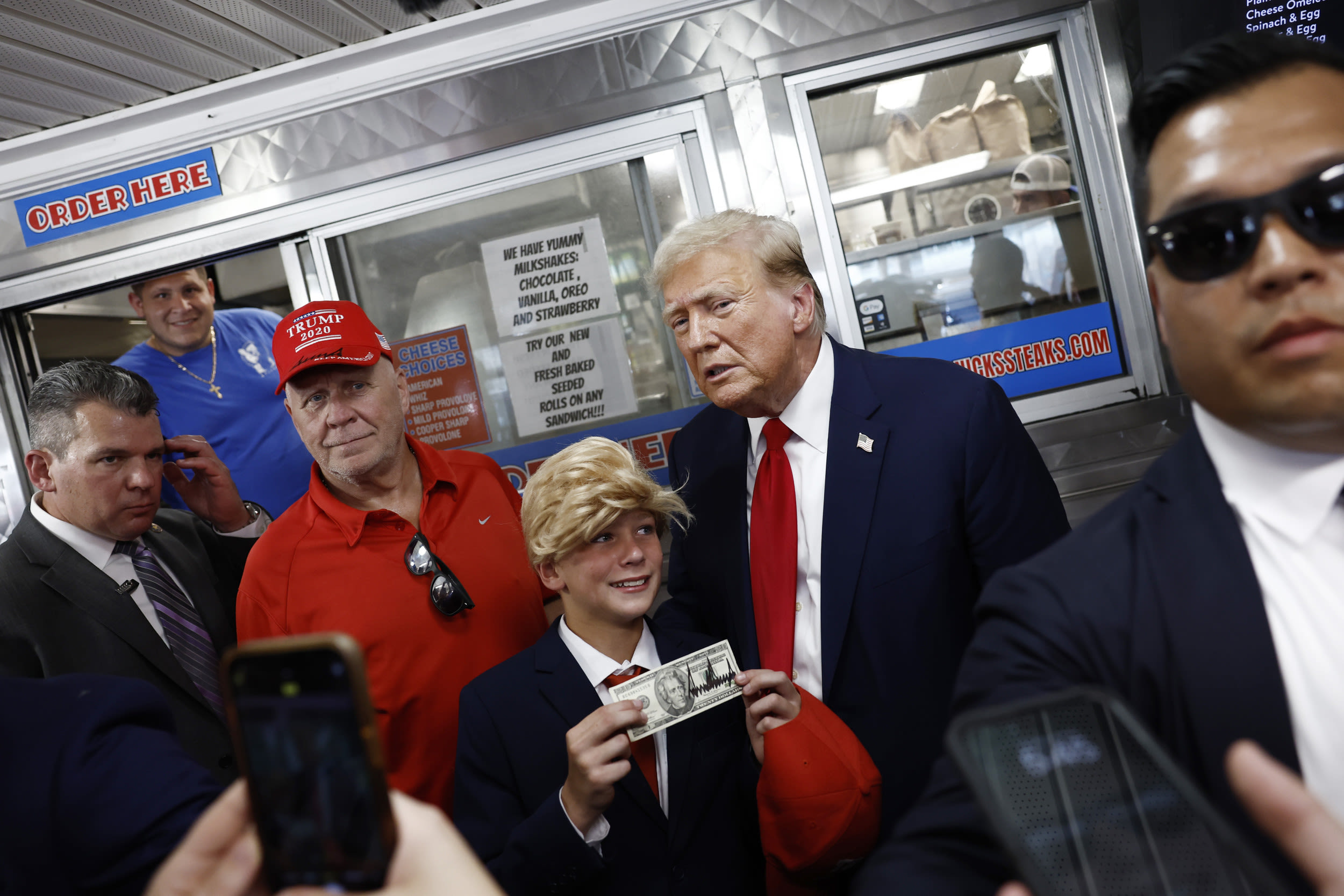 Donald Trump brings young supporter in Trump wig to tears in viral video