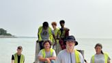 16 special needs youth cleaning up Sterling State Park