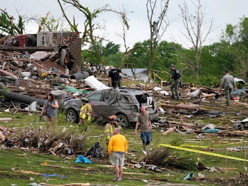 Tornado-spawning storms left multiple people dead in Iowa and are now threatening cities from Texas to New York