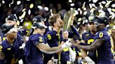 Auction includes exclusive Michigan national championship memorabilia