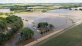 Millions in US prepare for more sweltering heat. Floodwaters inundate parts of Midwest