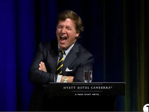 Tucker Carlson Takes on Australian Reporter After Searing Putin Question