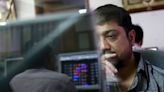 Indian shares edge up ahead of budget; Adani stocks rise