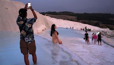 The magical white stone wonderland with effervescent bathing pools