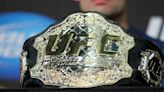 UFC boss Dana White presents Bill Belichick with title belt