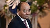 Vietnam's President Phuc quits, blamed for ministers' 'violations'