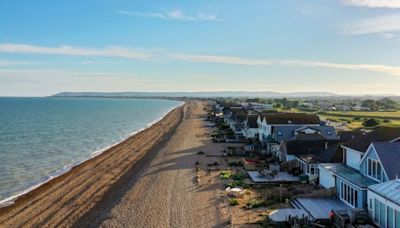 Pretty UK seaside village with beautiful beach but hardly any tourists