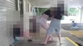 Awful moment a girl is punched in the face by another teen