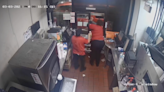 Fast food worker shoots at pregnant customer through drive-thru window in fight over curly fries