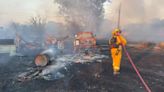 Grass fire torches home, more than a dozen vehicles in Sacramento