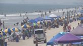 ‘I really like it here’: Visitors, residents flock to Central Florida beaches