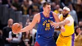 Nuggets celebrate first NBA championship with banner, rings and 119-107 win over the Lakers