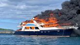 3 people, 2 dogs rescued after jumping off burning 70-foot yacht off New Hampshire coast