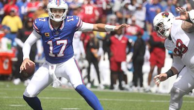 Josh Allen throws for two TDs, runs for two as Bills hold on for 34-28 win