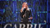 Carrie Underwood frightens fans with fall after rainy show