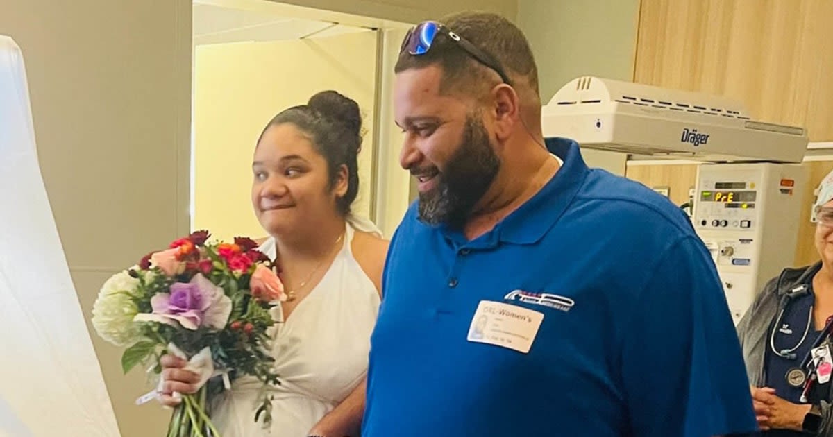 Pregnant bride gets married in hospital wearing ‘wedding dress’ of bed sheets