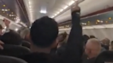 'Cheerio!' EasyJet passengers celebrate as rowdy couple carted off plane