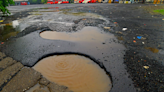 Mumbai potholes become unwanted rainy day attractions as streets turn into water parks