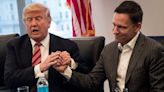 Peter Thiel says, 'if you hold a gun to my head I'll vote for Trump' though he isn't backing campaign