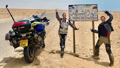 They set off around the world on a motorcycle and 'fell off many times.' Now they’re in the record books