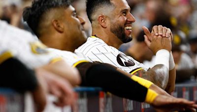 San Diego Padres backups Donovan Solano, left, and David Peralta, shown against the Arizona Diamondbacks at Petco Park in San Diego.