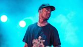 Rapper Travis Scott is arrested in Miami for trespassing and intoxication