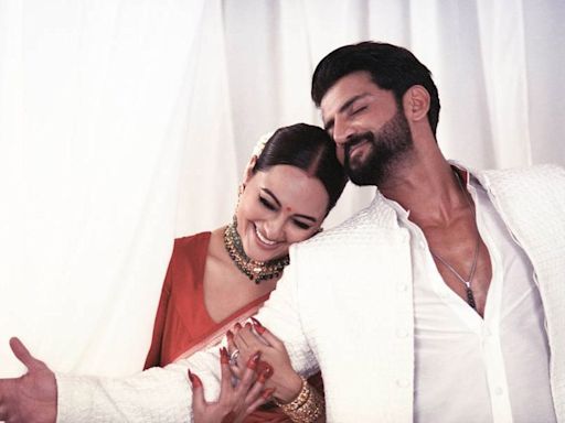 Sonakshi Sinha and Zaheer Iqbal listen to Shah Rukh Khan's voice note in fresh wedding photos