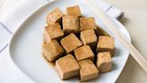 Toss Your Tofu In Marinade Ahead Of Time For An Infusion Of Flavors