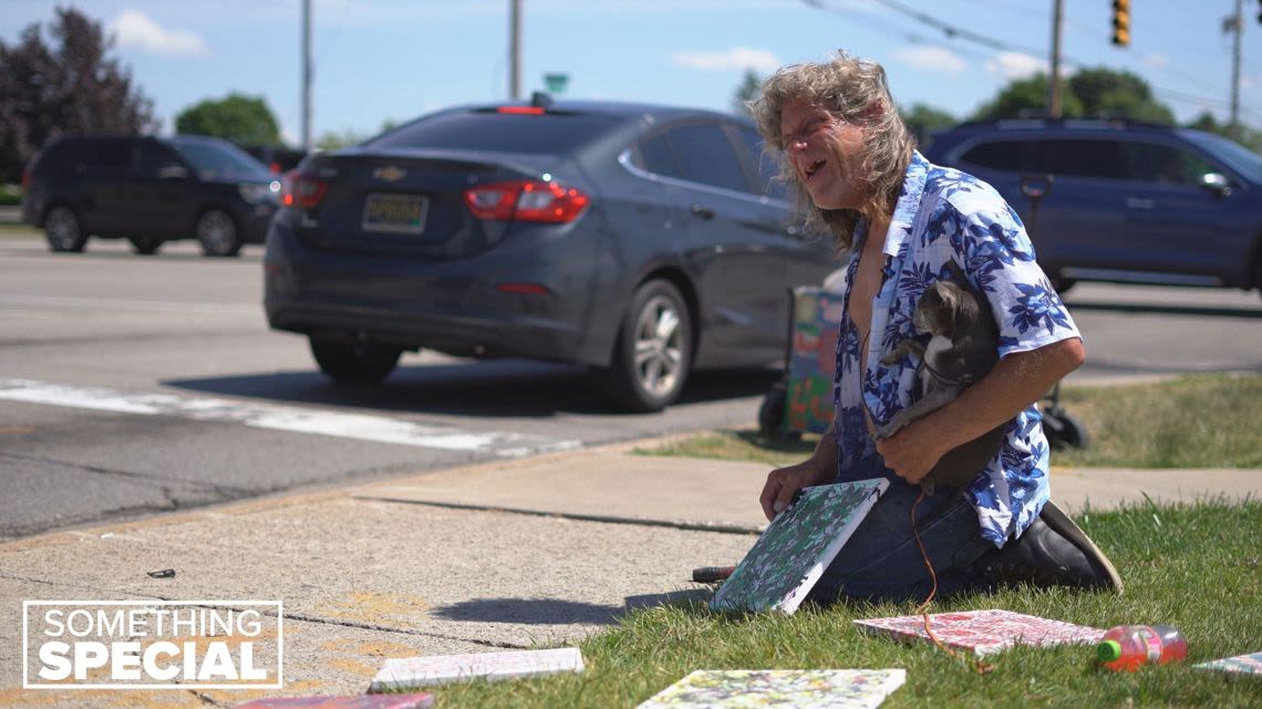 Man who's unhoused finds home in painting on a Kentwood curb