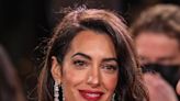 Amal Clooney Flashes Her Long Legs In A Yellow Mini Dress While On A Romantic Stroll With George Clooney & Their New...