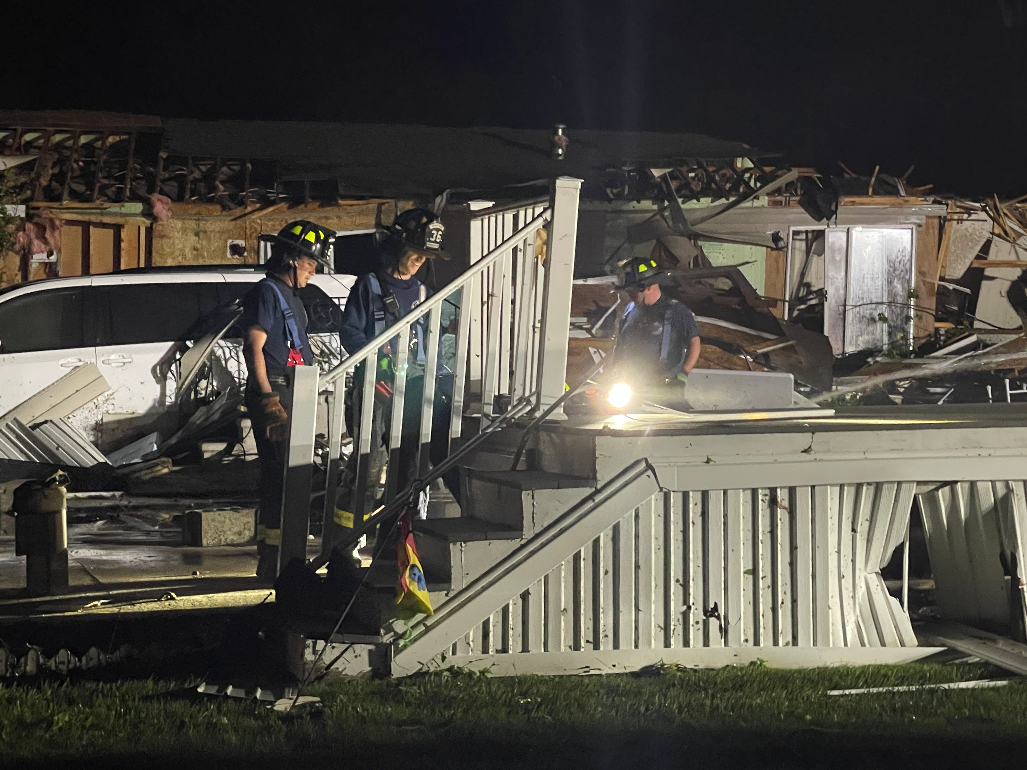 After tornadoes tear through west Michigan, emergency workers search through wreckage