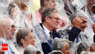 'We're used to rain': UK PM Keir Starmer at Paris Olympics getting drenched; pic goes viral - Times of India