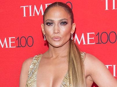 JLo is *so* naked posing topless in leopard print knickers and XL necklace