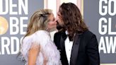 Heidi Klum Wore a Barely-There Silver Cutout Mini Dress While Kissing Her Husband on Golden Globes Red Carpet