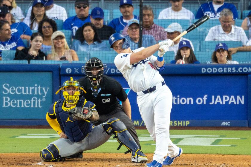 Will Smith hits three home runs as offense carries Dodgers past Brewers