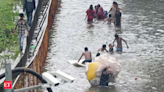Mumbai building collapses kills 1, lake overflows as rains lash city - The Economic Times