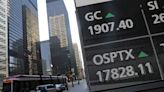 TSX squeaks out record high as resource shares climb