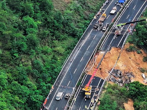 Highway collapse in China kills at least 36 people as cars sent crashing down into pit